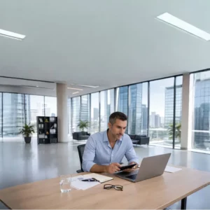 An HR professional reviewing financial documents.